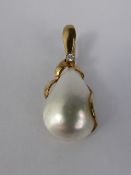 A 9ct Yellow Gold Mabe Pearl and Diamond Pendant, Pearl approx 20 x 12 mm, mm MM Ltd. Wt 2.8 gms