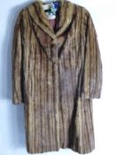 A Lady's Full Length Brown Mink Pelt Coat.