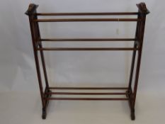 An Edwardian Mahogany Inlaid Clothes Rail, with turned spindle supports to the top, approx 97 x 84 x