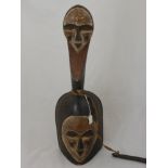 West African Gabonese Vouvi Gong/Bell, the wooden gong carved with heart shaped mask to both body