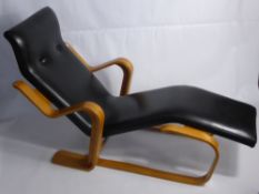 Marcel Breuer (1902-1981) Bent Ply Long Chair, with padded leather seat, approx 130 cms in length.