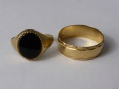 A Gentleman's 9ct Gold Hallmarked Wedding Band, size U together with a Gentleman's 9ct gold black