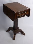 An Antique Mahogany Drop Leaf Sewing Table, with ivory key plates and turned ivory knobs, approx