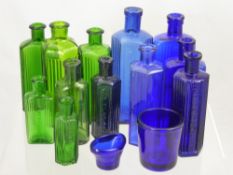 A Quantity of Vintage Blue and Green Medicine Bottles, including an eye bath.