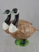 A Pair of Ceramic Geese, stamped Valencia Spain, together with a Portuguese factory porcelain