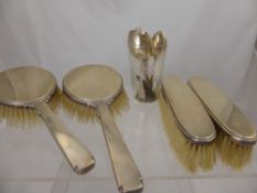 A Lady's Art Deco Silver Dressing Table Set, including two clothes brushes, two hair brushes,