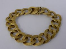 A Lady's Vintage 9ct Yellow Gold Curb Link Bracelet, with bark finish, continental mark, approx 57