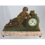 A Bronze and Rose Marble Clock, depicting a reclining lady playing a harp together with a pair of