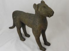 A Benin Bronze Leopard, (Nigeria), depicted standing in a menacing pose, revealing fangs, the body