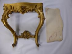 A 19th Century 'Louis XV1' Style Gilt Wood and Plaster Hall Table, the table having laurel