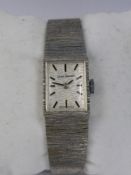 A Lady's Solid Silver Jean Rennet Bracelet Watch, nr 21968, the watch having bark finish bracelet