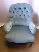 A Victorian Button Back Bedroom Chair, on turned feet, in 'Duck Egg Blue' velvet upholstery.