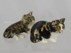 Two Winstanley Porcelain Cats, depicted reclining and seated, with marks to base. (2)