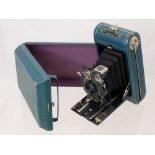 A Green Leather Vest Pocket Kodak Series III, covered folding camera, approx 14 x 8 cms