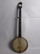 A Circa 1903 'Clifford Essex' Open Back Five String Banjo, the banjo has a mahogany neck with an