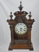 An Oak Cased Wall Clock, with white enamel face and Roman dial, with double mercury pendulum, approx