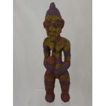 A Bamileke (Cameroon) Ancestral Figure, depicted standing with profuse colourful beading, approx