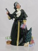A Royal Doulton Figurine, entitled 'Christmas Parcels', nr HN 2851, approx 22 cms