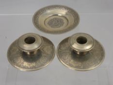 A Persian Silver Trinket Dish, together with two Persian silver taper candlesticks, approx 254 gms
