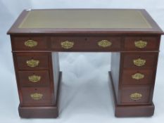 A Small Mahogany Partners Desk, with green olive tooled leather insert, approx 76 x 105 x 58 cms