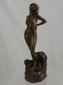 T.T. Nielson, A Bronze Figure of a Naked Lady, with a male crouched at her feet, approx 38 cms