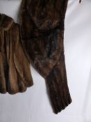 A Brown Mink Fur Stole together with a Mink Short Jacket.