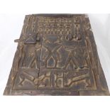 A Wooden West African Dogon (Mali) Granary Door, interesting carving, depicting mythological