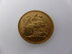 A Victorian Full Gold Sovereign, dated 1895.