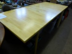 A Contemporary Rubberwood Kitchen Table, with folding central extension, approx 75 x 182 x 86 cms