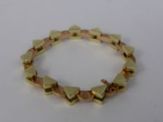 A Lady's Vintage 14 ct Yellow and Rose Gold Triangular and Curved Link Bracelet, approx 18 gms