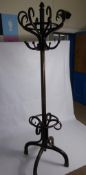 A Thonet Style Bentwood Hat, Coat and Stick Stand, with turned finial, eight scrolling hat hooks,