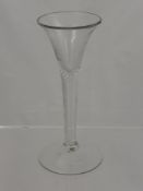 A Georgian Fortified Wine Glass, flared bowl and ribbon air twist stem, approx 16.5 cms