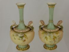 A Pair of Royal Worcester Blush Ware 'Putti' Vases, Reg 304840, with puce factory mark dated 1956,