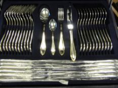 A 12 Piece Stainless Steel Cutlery Set, stamped 22 gold plated, together with a case of supper