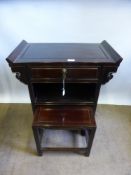 A Chinese Rosewood Altar Table, with raised edges and panel top and sides, single drawer with