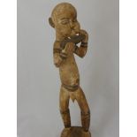 A Ghananian Carving of a Keta Flute Player, approx 63 cms together with an Ashanti Fertility