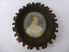 An Antique Portrait Miniature, painted on copper, signed Dorian, presented in a decorative copper