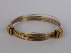A 9ct Tri-Gold Elephant Bracelet, approx 25 gms