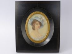 A Pair of Antique Portrait Miniatures, painted on ivory, depicting a military officer and a