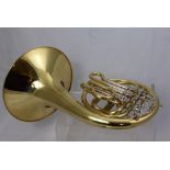 A J. Michael (Japanese) Brass French Horn, in the original fitted case.