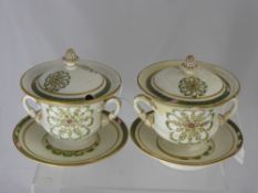 A Pair of Continental Soup Tureens, with floral decoration and acorn finial's.