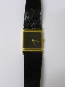 A Gentleman's Vintage 18 ct Gold Jaeger le Coultre, case weight, on a black leather strap, approx 24