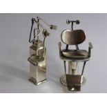 A Continental Solid Silver Hand Made Miniature Dentist's Chair and apparatus stand, stamped 925,