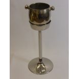 A Silver Metal Wine Cooler on Stand.