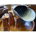 A Quantity of Copper, including coal scuttle, three graduated jugs and a fireside kettle. (5)