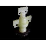 Chinese 20th Century White Jade Vase and Cover, the censer shaped vase featuring a plain body and