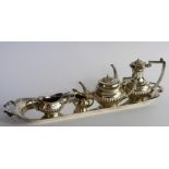 A Silver Miniature Tea/Coffee Set, comprising tea pot, coffee pot, sugar bowl and milk jug and