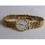 A Lady's 18 Ct Yellow Gold Longines Quartz Wrist Watch. The watch having Roman numerals on an 18