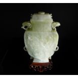 Chinese 20th Century White Jade Vase and Cover, the vase of flattened shield form with carved