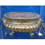 A Mid 18th Century Brass Jardiniere, with it's original lead liner, with lion mask and ring